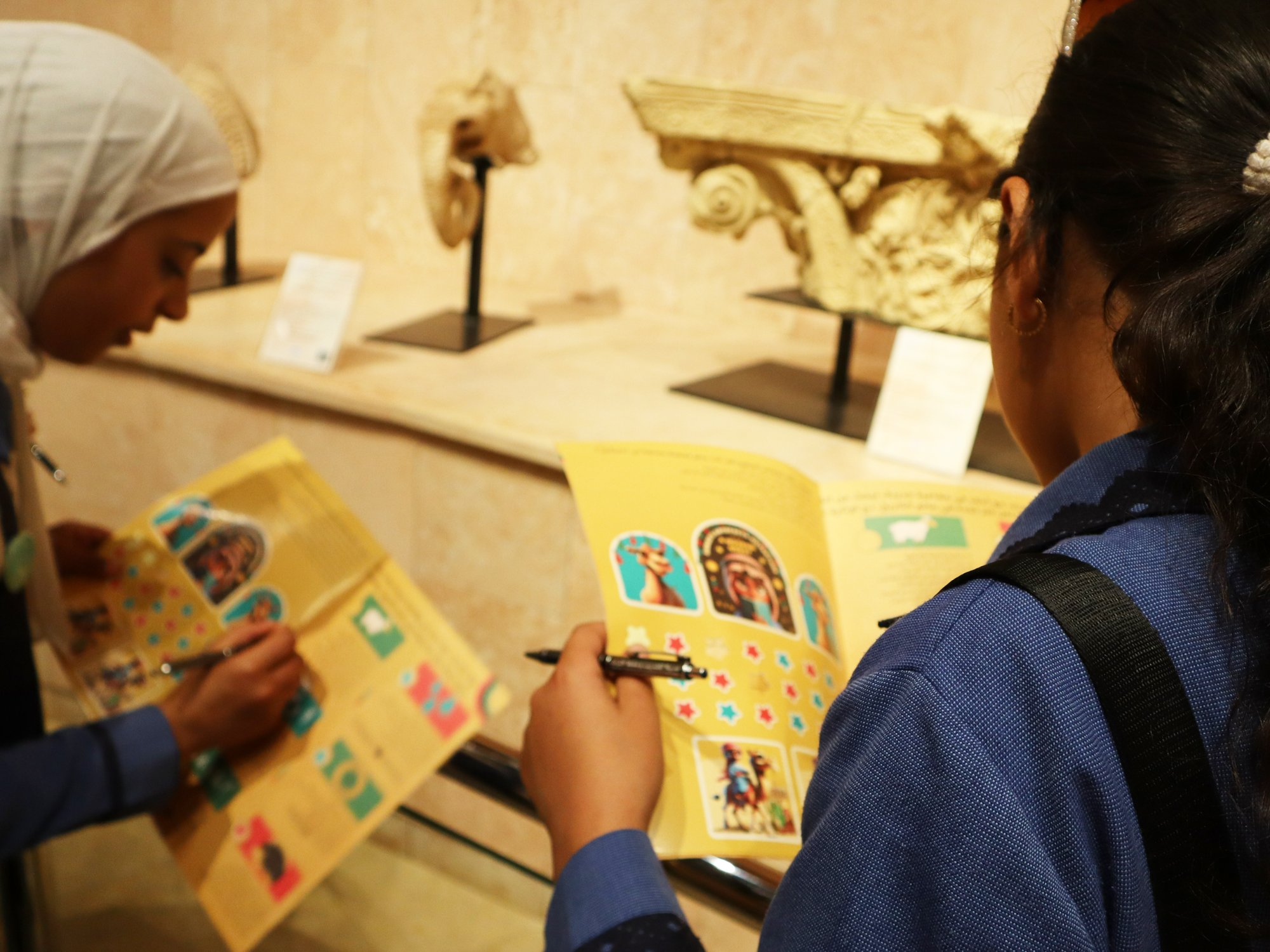 Activity book — children in the museum with artefacts